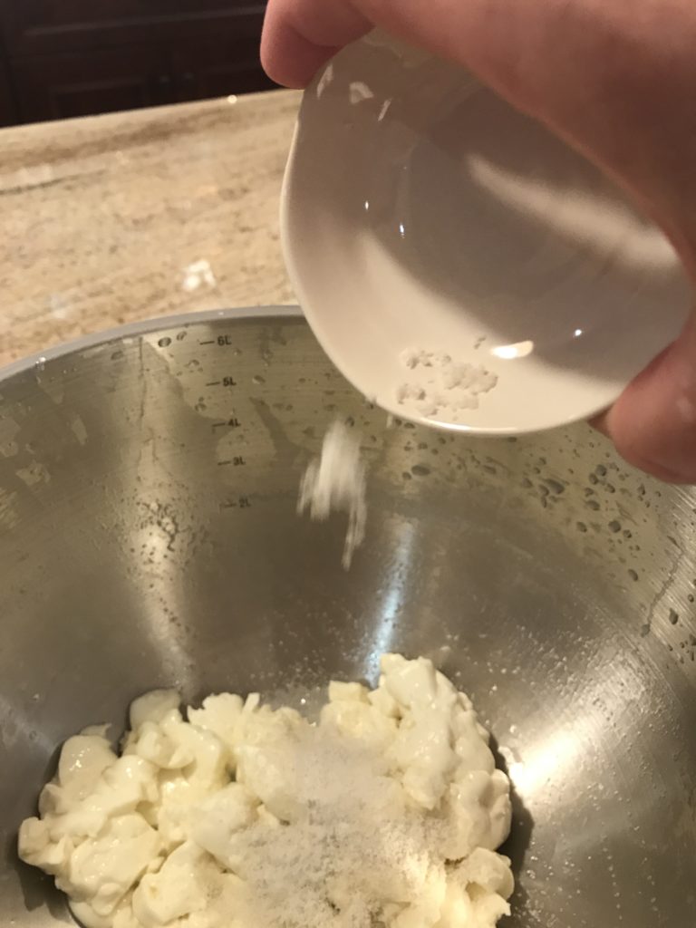 Adding salt to the cheese