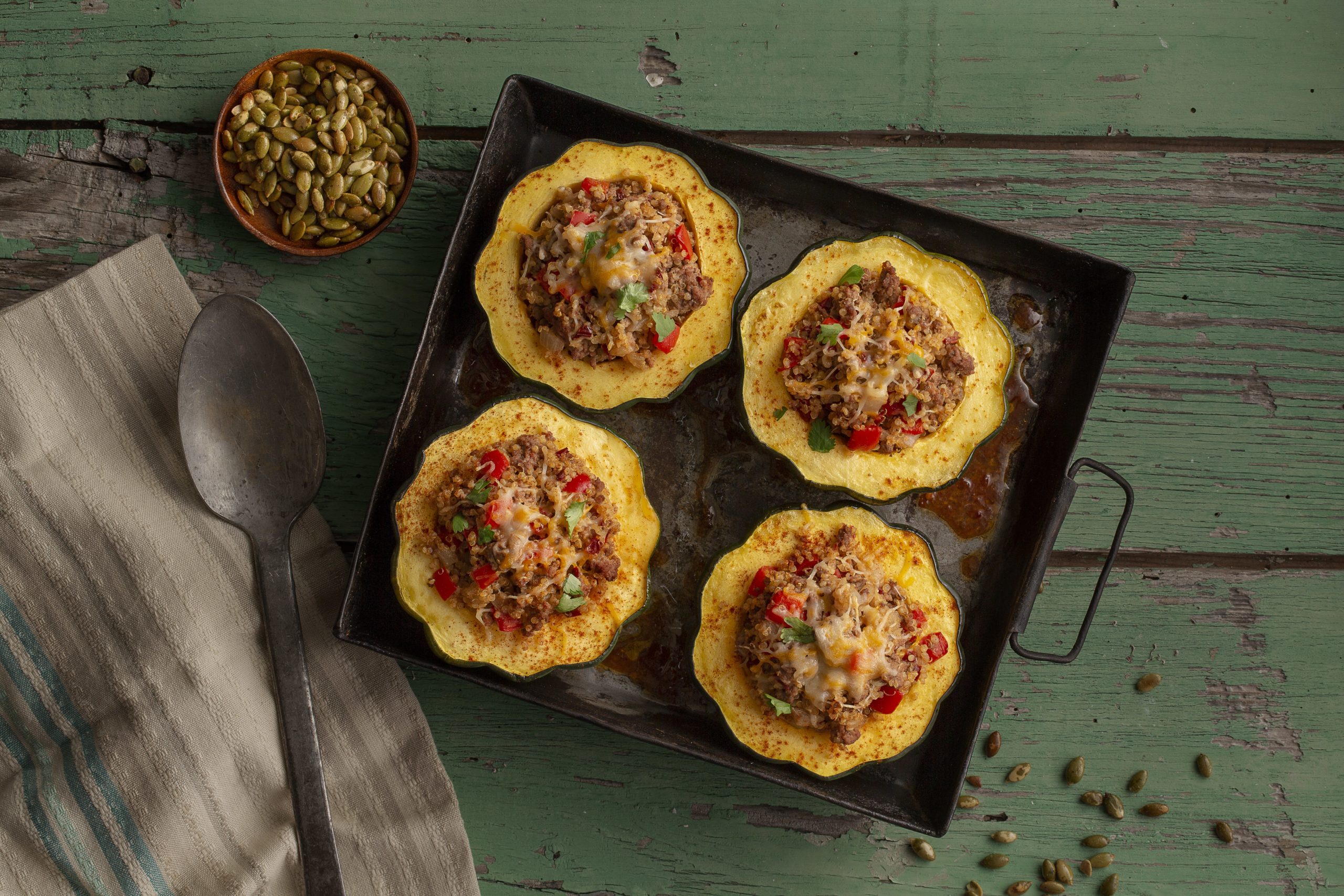 A tray of stuffed acorn squash