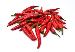 A pile of spicy red chili peppers