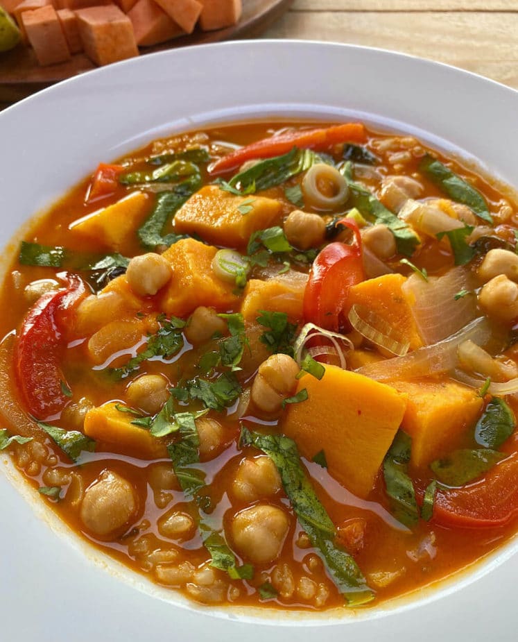 A white bowl filled with Thai Red Curry Soup