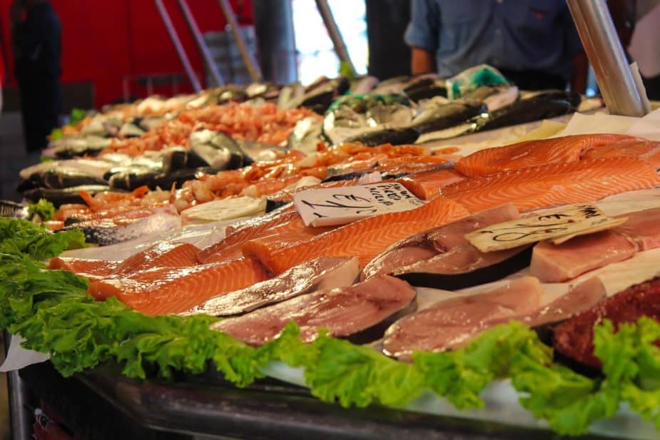 Fresh fish market with a display of fresh seafood. Including seafood is a good for brain health.