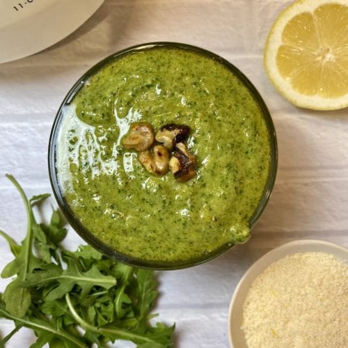 A bowl of Arugula Walnut Pesto