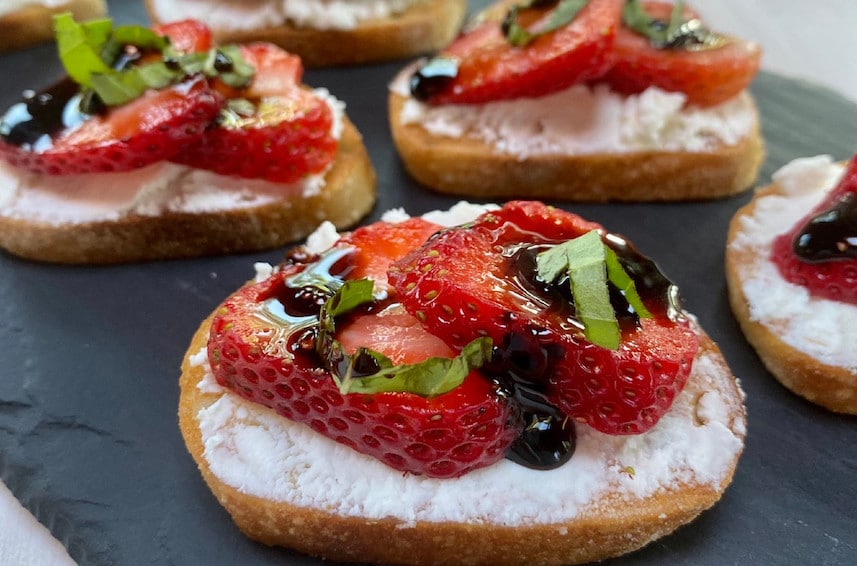 Starwberry Balsamic Crostini on a slate serving platter