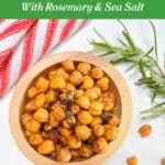A bowl of roasted chickpeas on a white counter. The title, "Crispiest Roasted Chickpeas is on the top