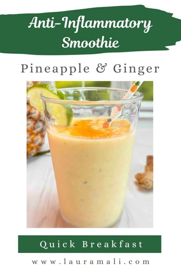 An anti-inflammatory smoothie in a clear glass sprinkled with turmeric