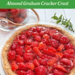 Strawberry Pie on a white picnic table with a clear bowl of fresh strawberries in the background. The title Easy Strawberry Pie Recipe is at the top of the image on a green background.
