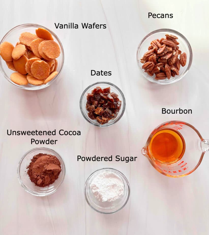 Ingredients for Bourbon Balls Ingredients to make bourbon balls on a marble counter