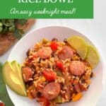 A white bowl filled with vegetables and turkey sausage