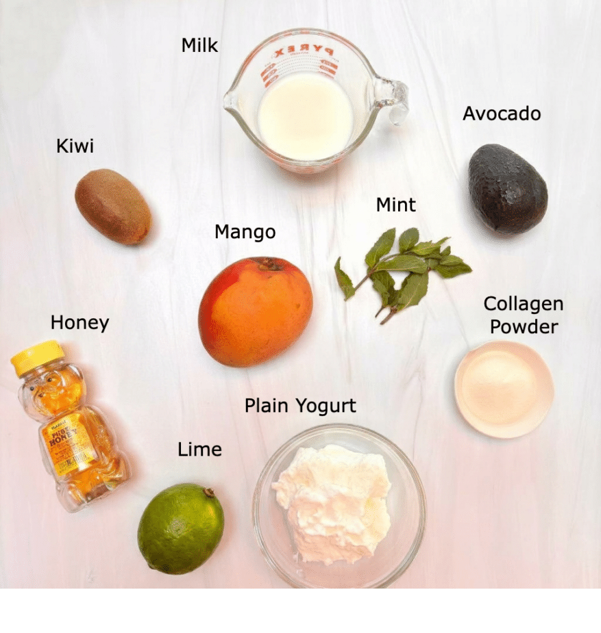 Avocado Mango Smoothie Ingredients Ingredients used to make the avocado mango smoothie on a marble counter