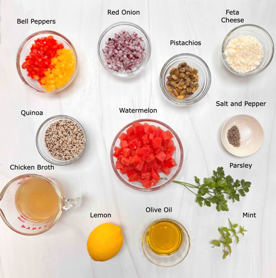 Watermelon Quinoa Salad Ingredients Ingredients used to make the Watermelon Quinoa Salad on a marble counter